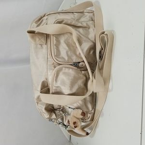 Champagne Kipling double handle satchel bag